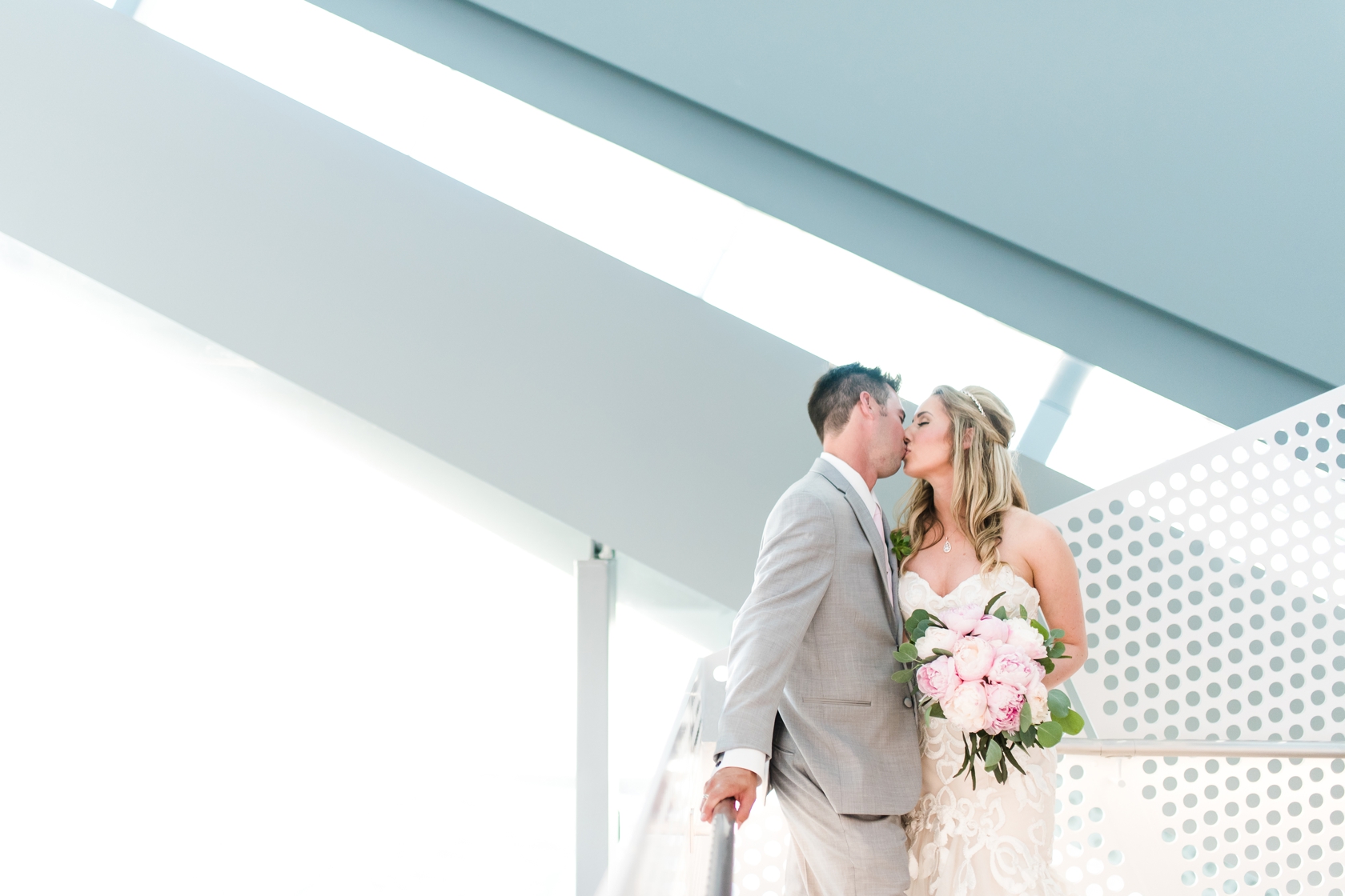 Bride and groom portraits at Perot Museum